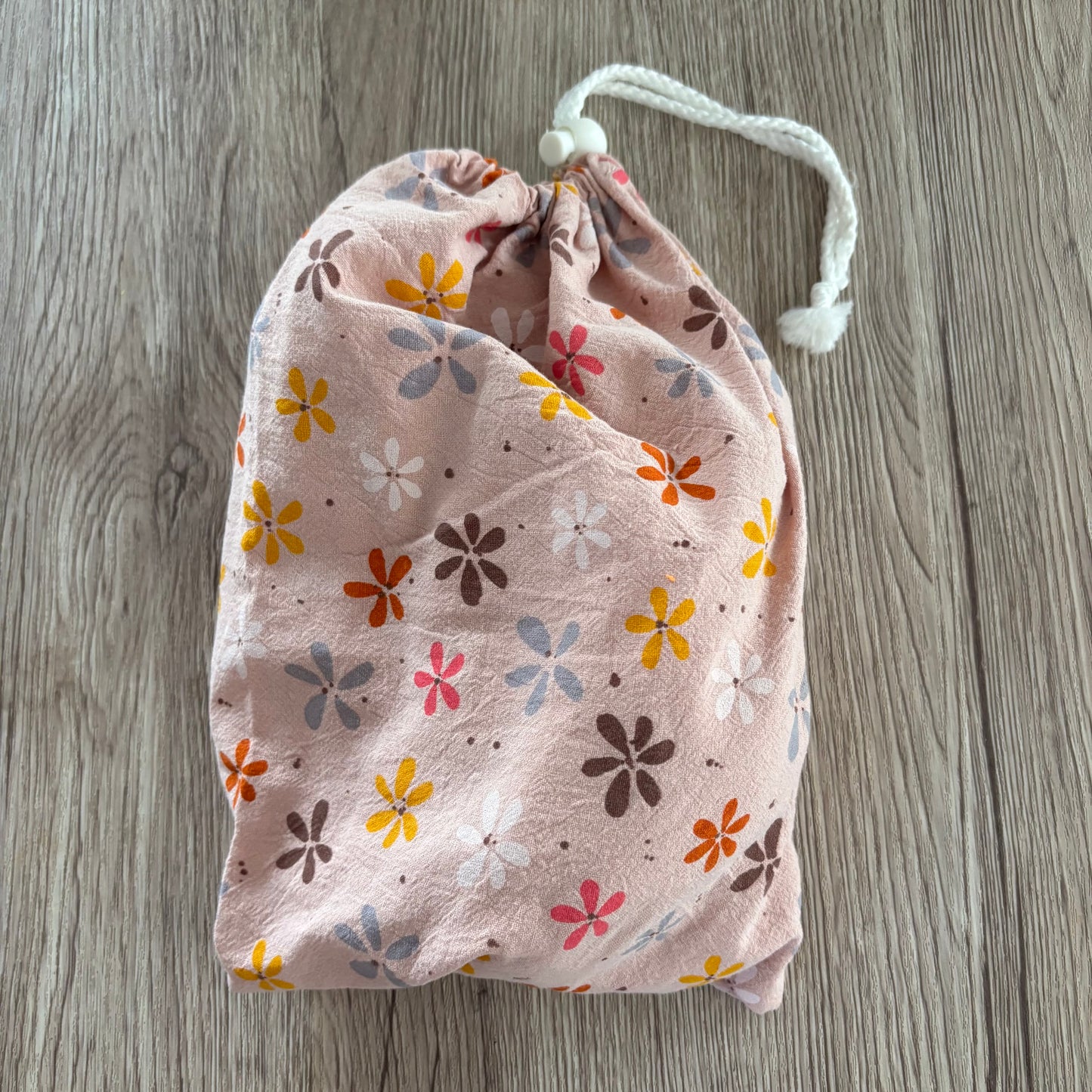PINK MULTI FLOWER FEEDING APRON