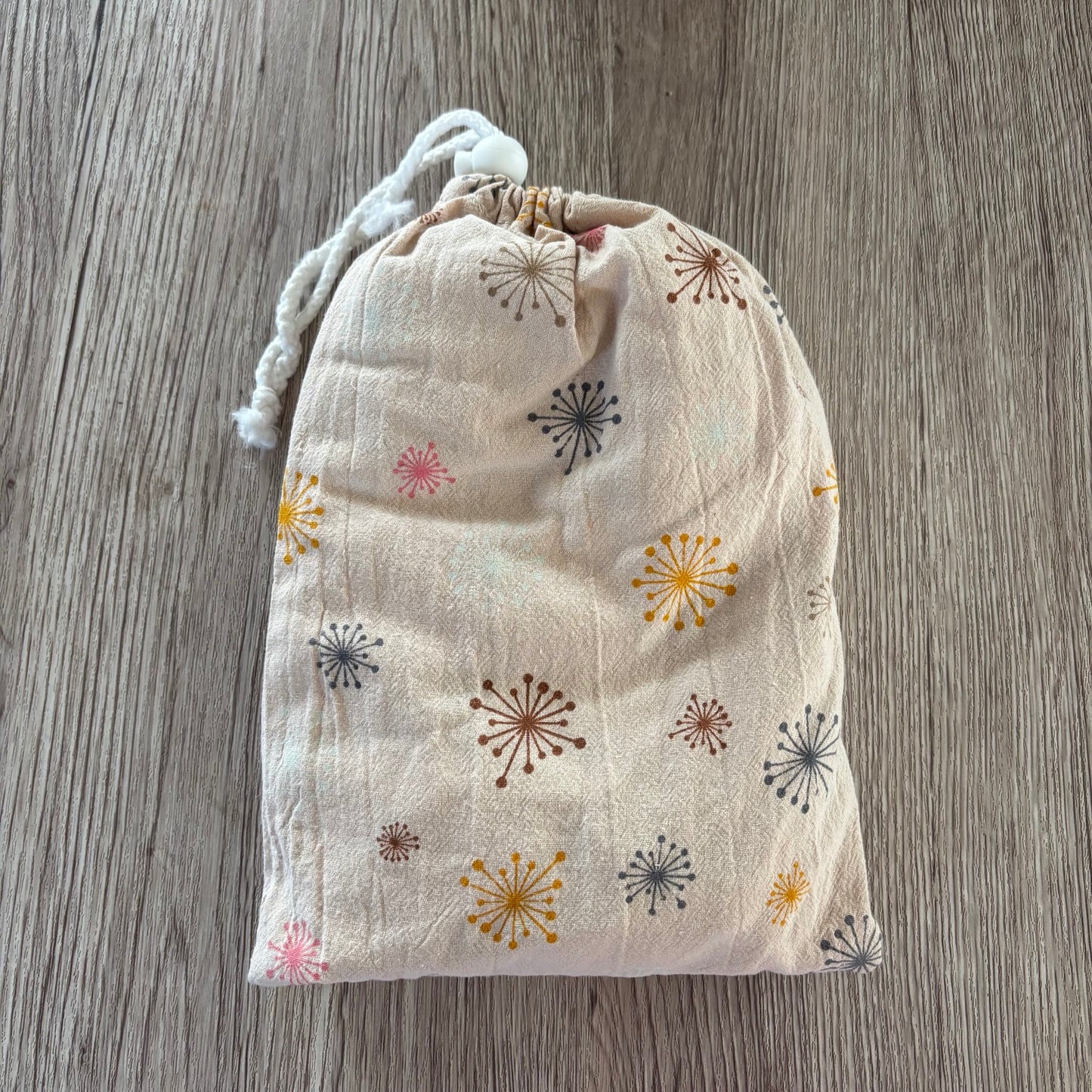 BEIGE DANDELION FEEDING APRON